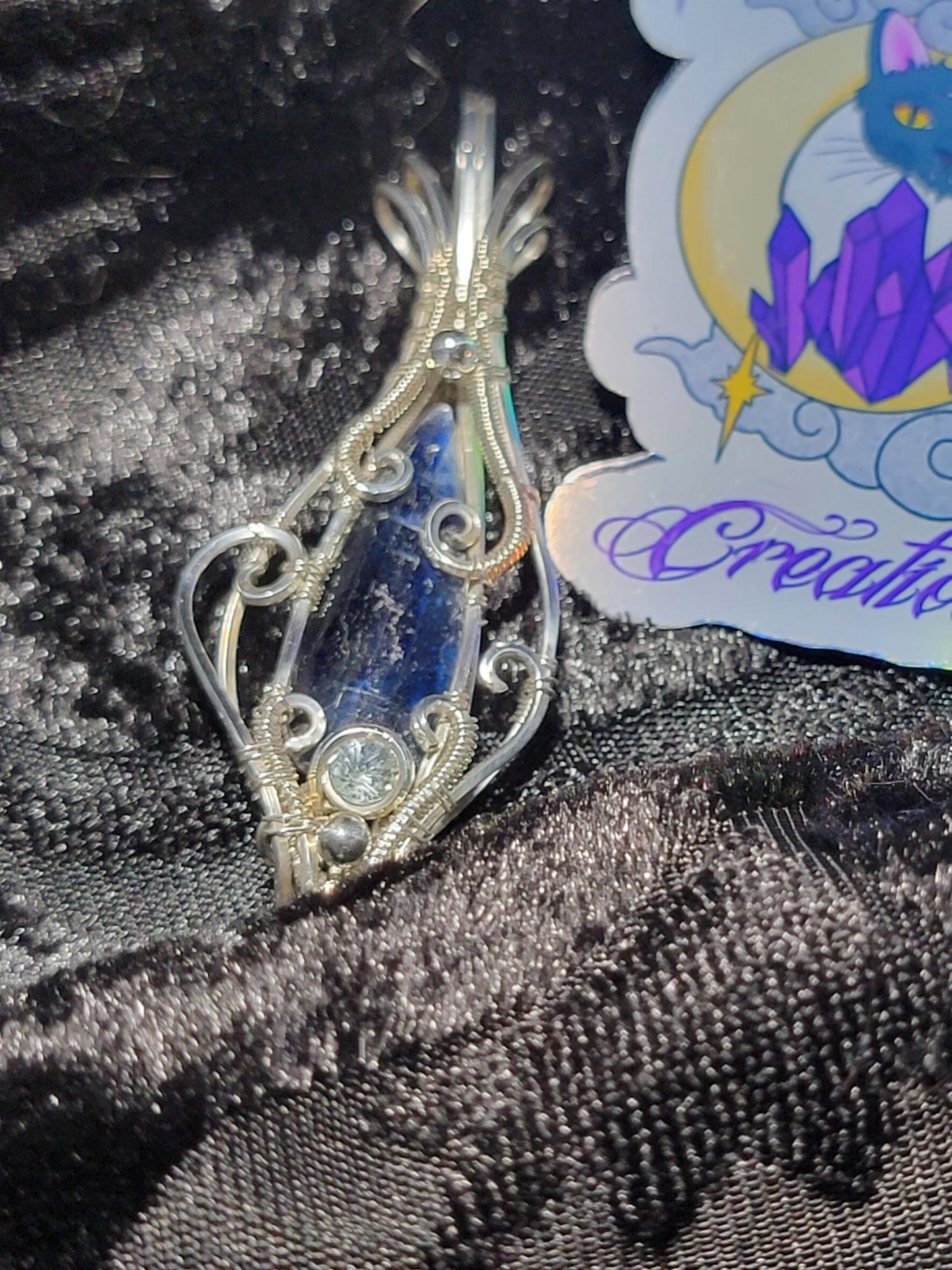 Blue Kyanite with Sky Blue Topaz in Sterling Silver Wire Wrapped Pendant