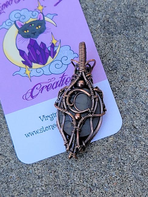 Ammolite w/ Peridot in Antiqued Copper w/ Peekaboo Crescent Moon in the Back Wrapped by Hand