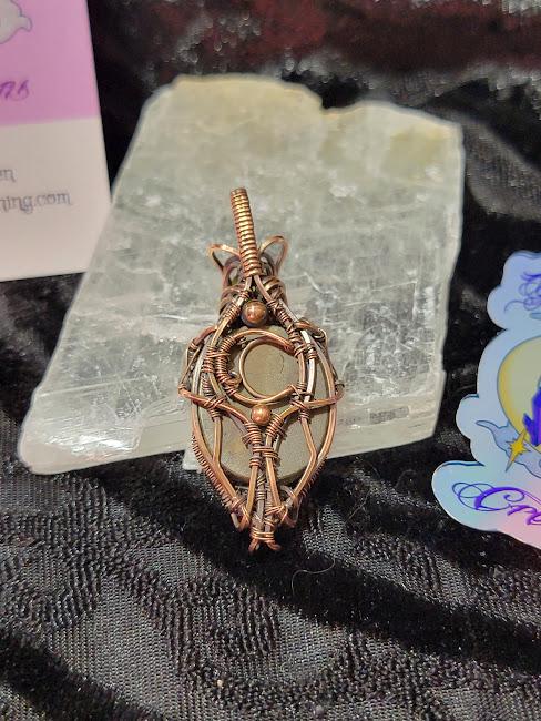 Ammolite w/ Peridot in Antiqued Copper w/ Peekaboo Crescent Moon in the Back Wrapped by Hand
